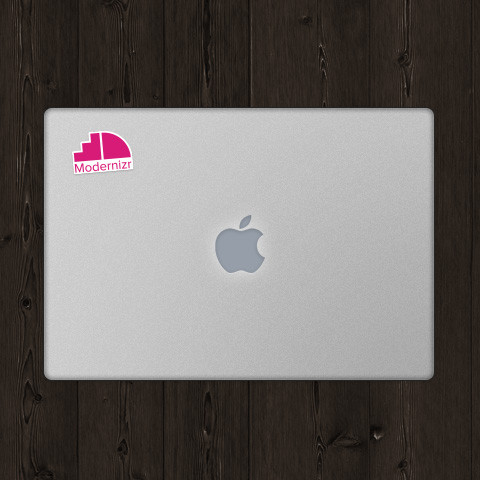 the top of a macbook pro, with the modernizr sticker in the upper left